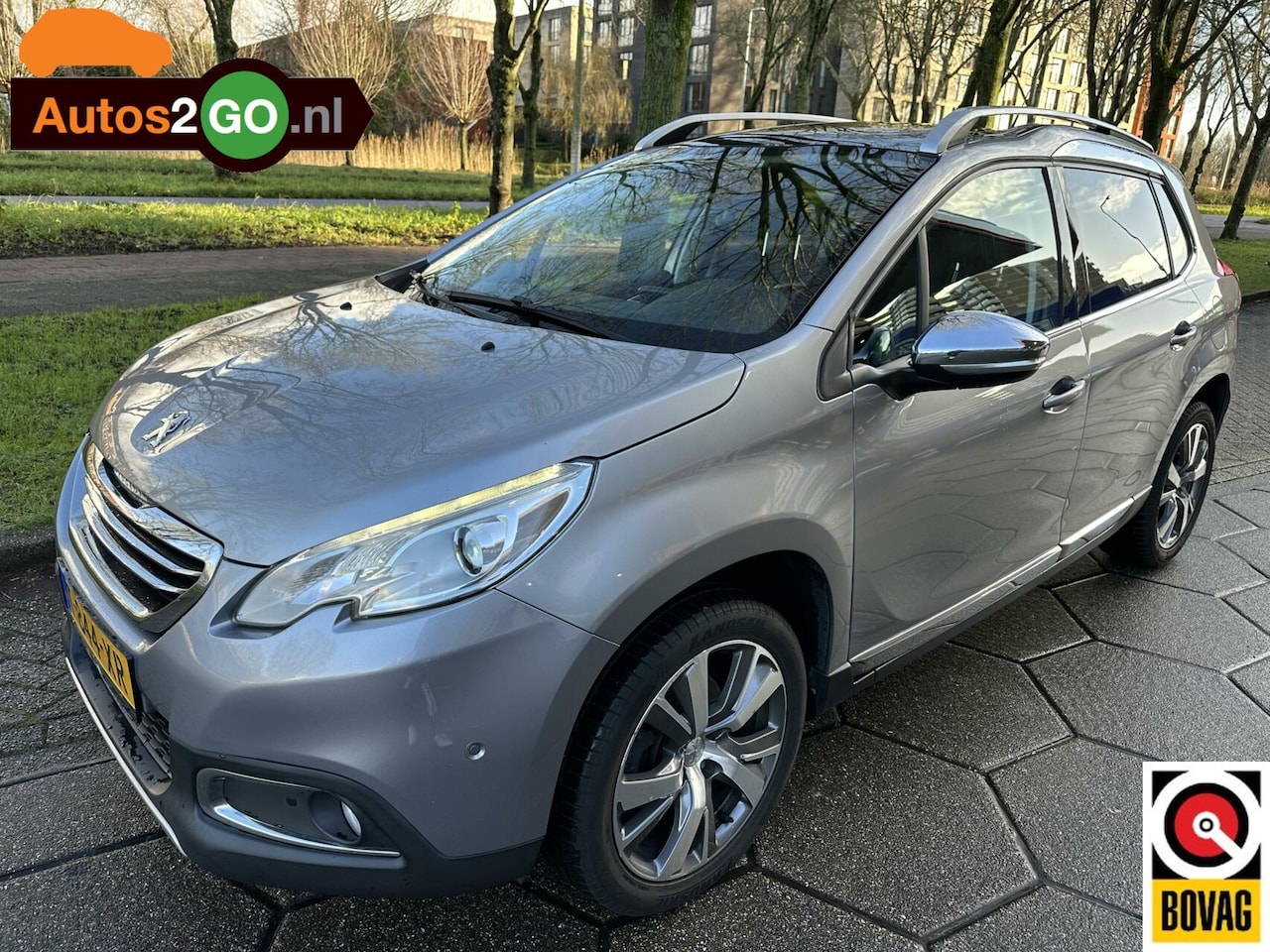 Peugeot 2008 - 1.2 PureTech Active I Navi I parkeersensoren I cruise controle I pan. dak I clima I all gr - AutoWereld.nl