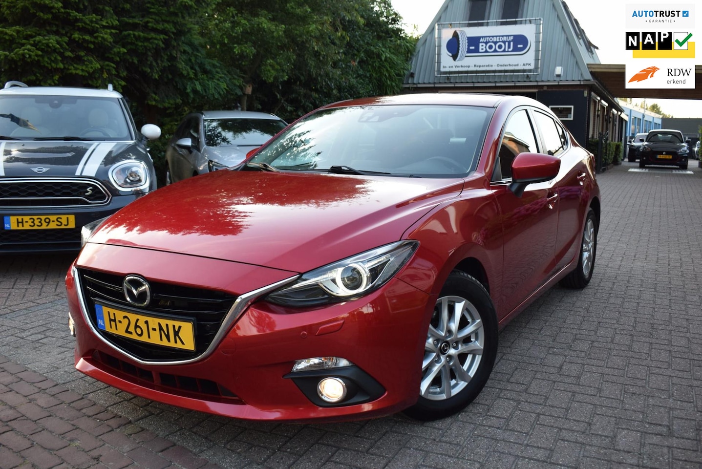 Mazda 3 - 2.0 GT-M 120 PK AUTOM/CRUISE/NAVI/AIRCO-ECC/XENON/PDC V+A/BLUETOOTH/LMW 16 INCH/STOEL VERW - AutoWereld.nl