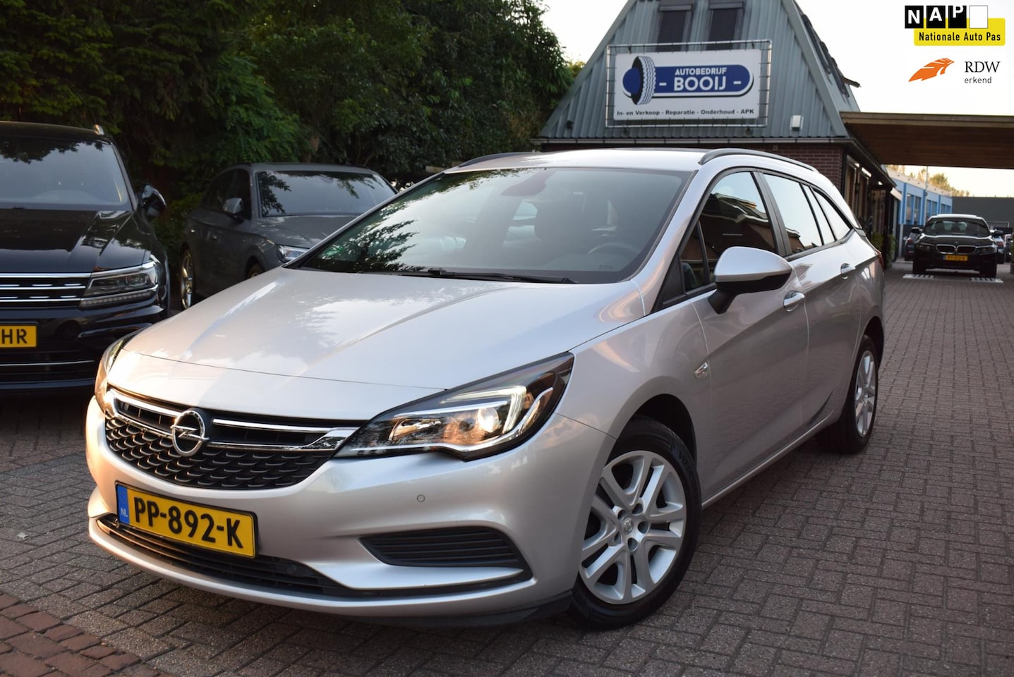 Opel Astra Sports Tourer - 105 PK Online Edition CRUISE/NAVI/AIRCO/NL-AUTO/PDC V+A/CAMERA/BLUETOOTH/LMW 16 INCH - AutoWereld.nl