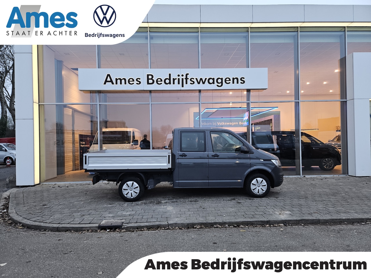 Volkswagen Transporter - 2.0 TDI L2H1 DC 110PK hand | radio | 6 zitplaatsen - AutoWereld.nl