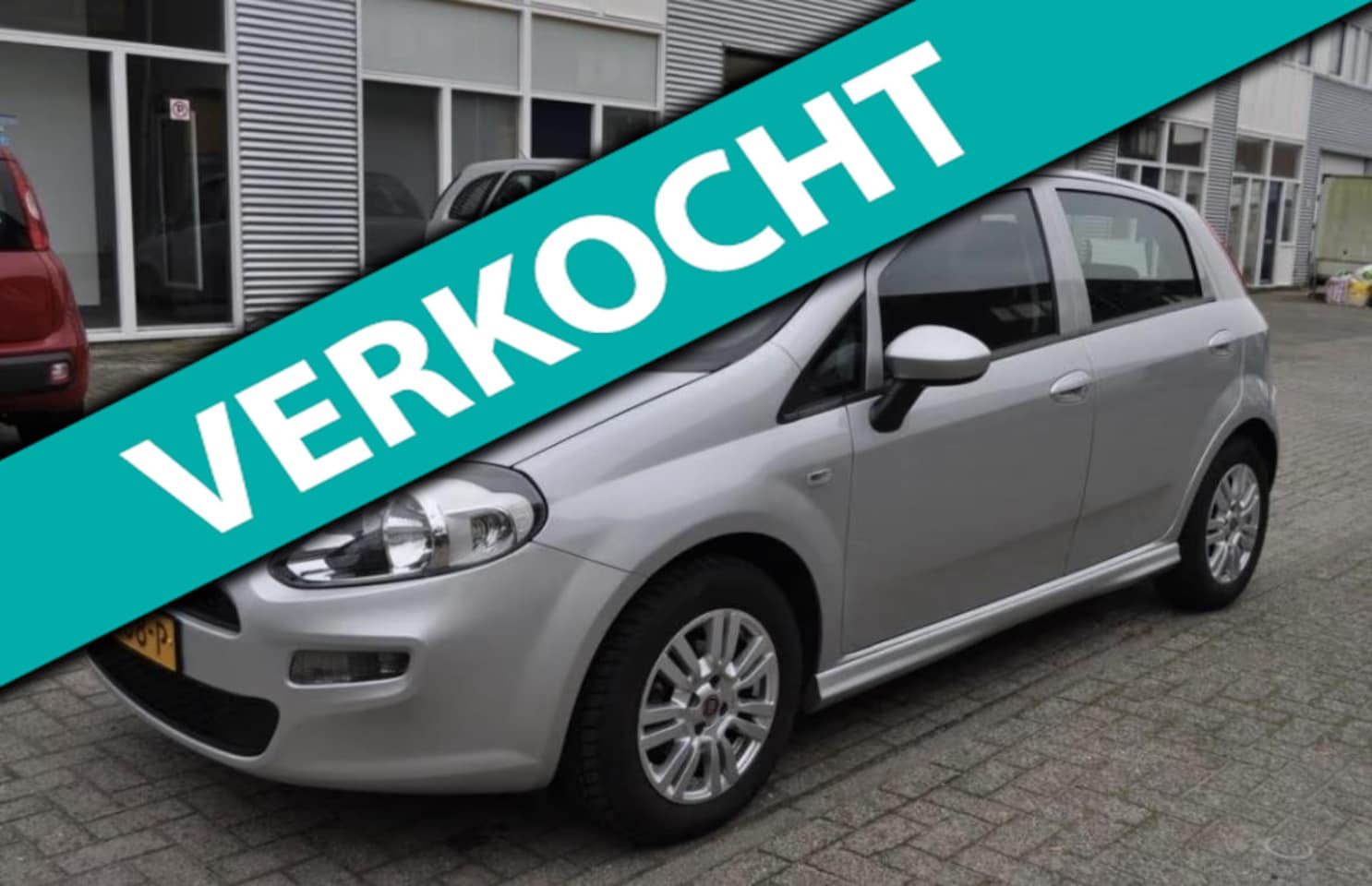 Fiat Punto Evo - 1.3 M-Jet Lounge 5drs Airco Cruise APK Topper! - AutoWereld.nl