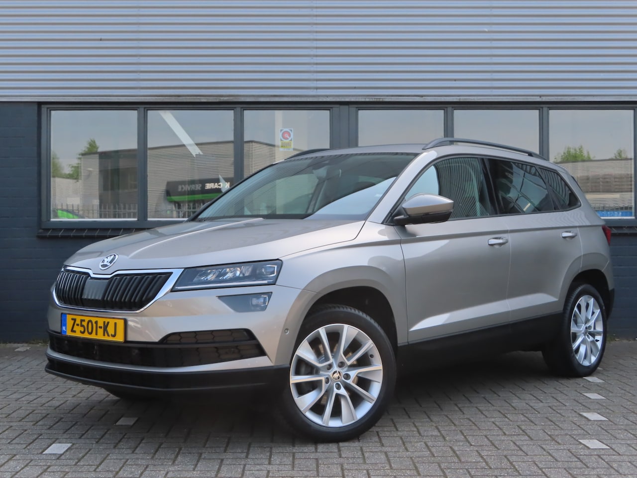 Skoda Karoq - 1.5 TSI ACT Style DSG | navi | voorruitverwarming | stoelverwarming | DAB | parkassist - AutoWereld.nl