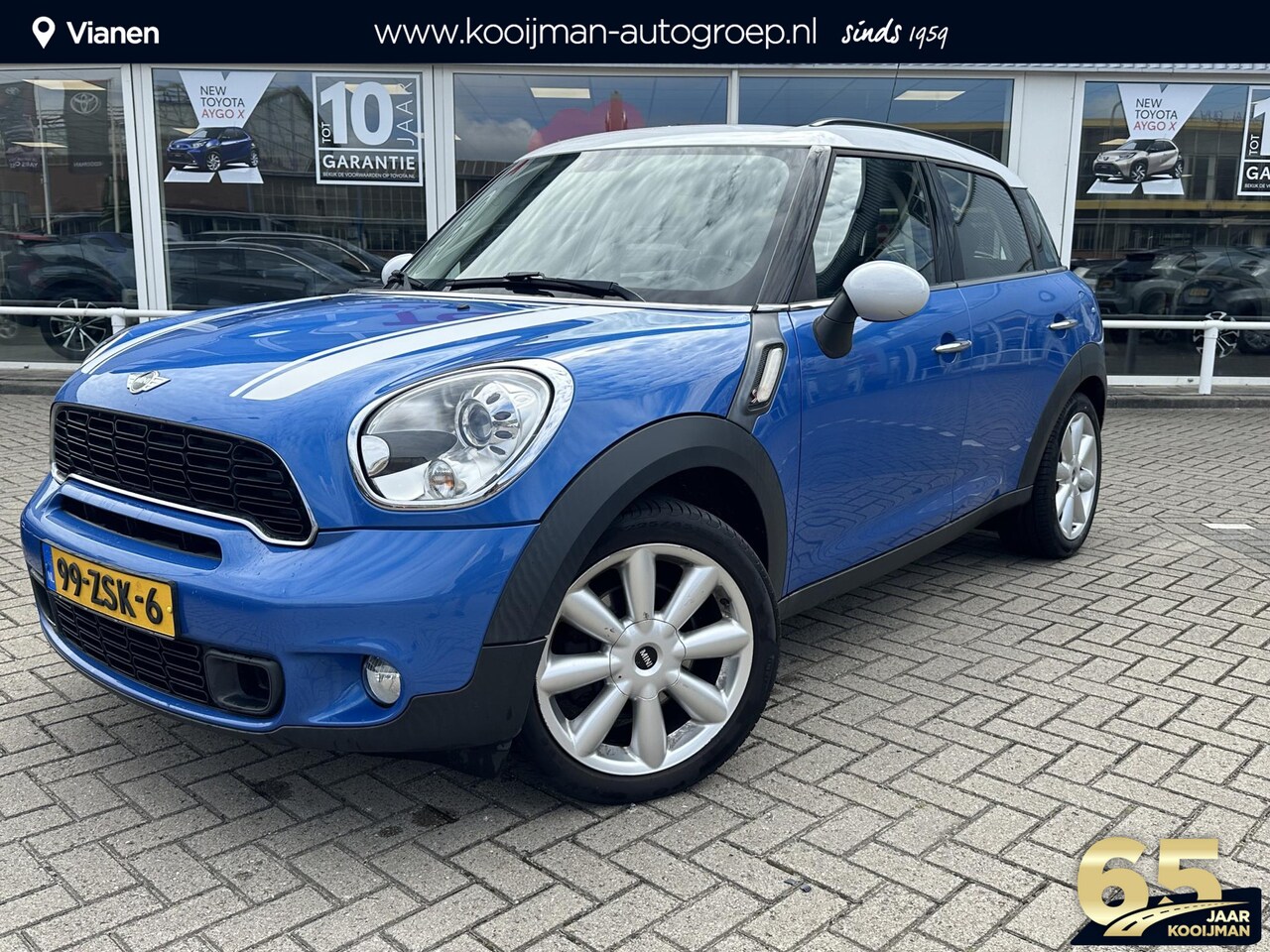 MINI Countryman - Mini 1.6 Cooper S Chili Parkeersensoren achter , Bluetooth , 18 Inch Velgen , half lederen - AutoWereld.nl