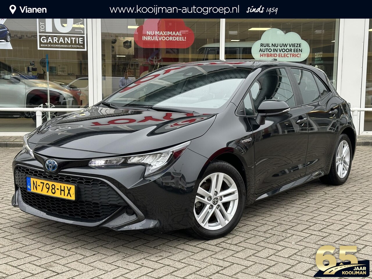 Toyota Corolla - 1.8 Hybrid Active + Trekhaak - AutoWereld.nl