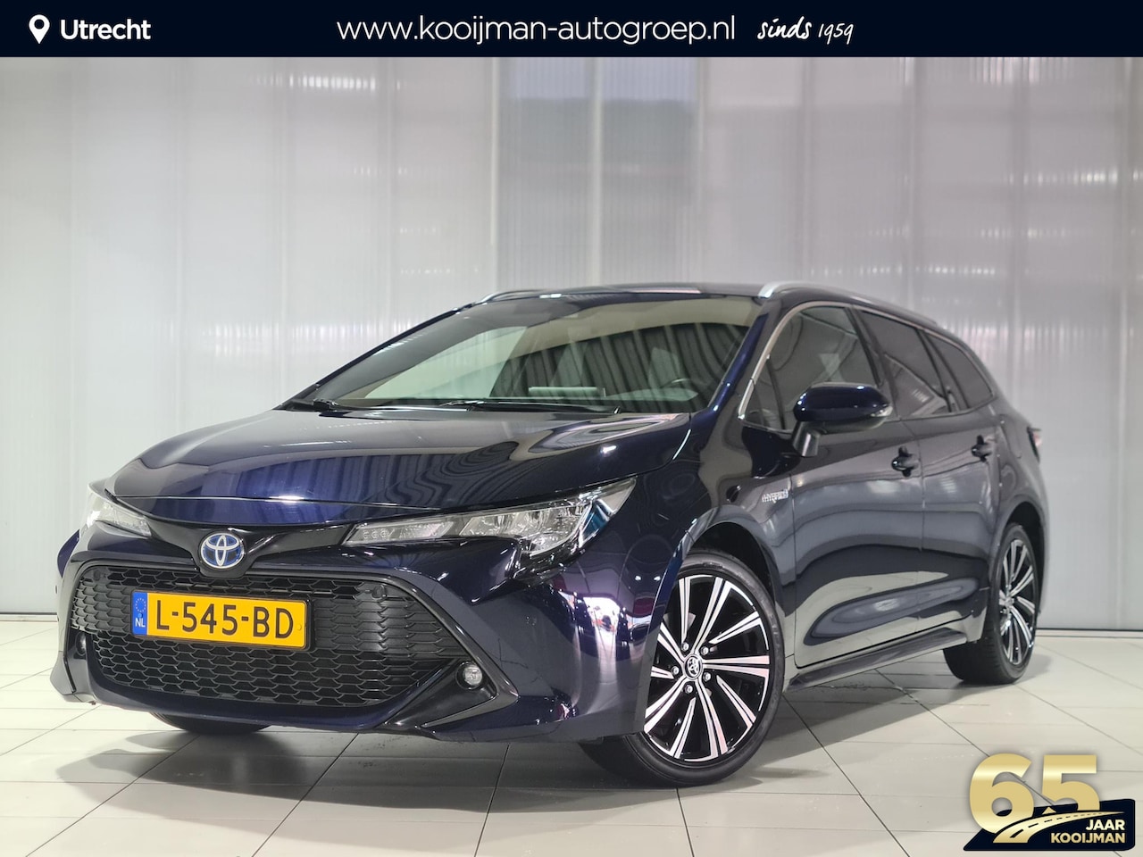 Toyota Corolla Touring Sports - 1.8 Hybrid Dynamic | Parkeersensoren | Full map navigatie | Keyless | Dual climate control - AutoWereld.nl