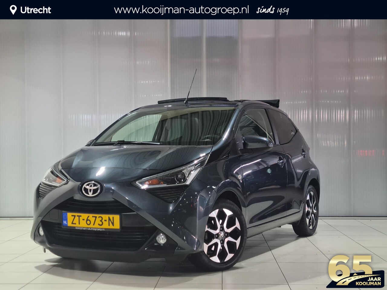 Toyota Aygo - 1.0 VVT-i x-cite | 1e eigenaar & zeer weinig km's! | Mét leuk cabriodak! | Elektr. Climate - AutoWereld.nl