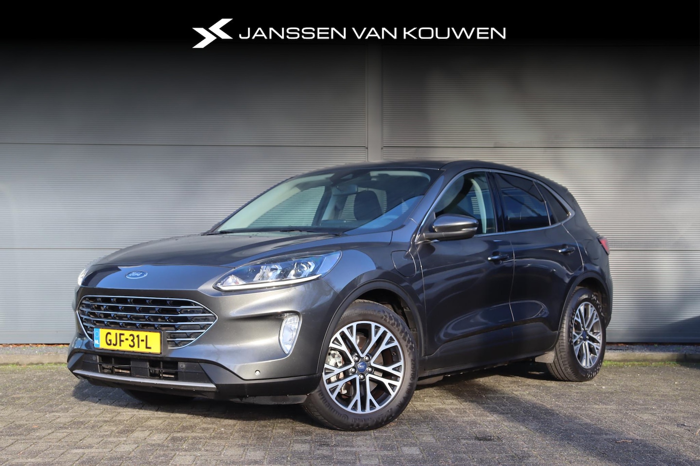 Ford Kuga - 2.5 PHEV Titanium / Navi / Carplay / Keyless / Achterklep elektrisch - AutoWereld.nl