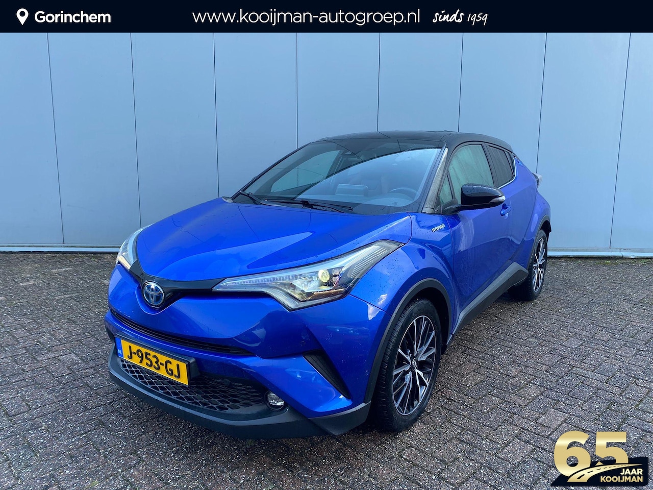 Toyota C-HR - 1.8 Hybrid Premium | 1e Eigenaar | Uniek Rood Leder bekleding! | Navigatie | Dodehoek dete - AutoWereld.nl