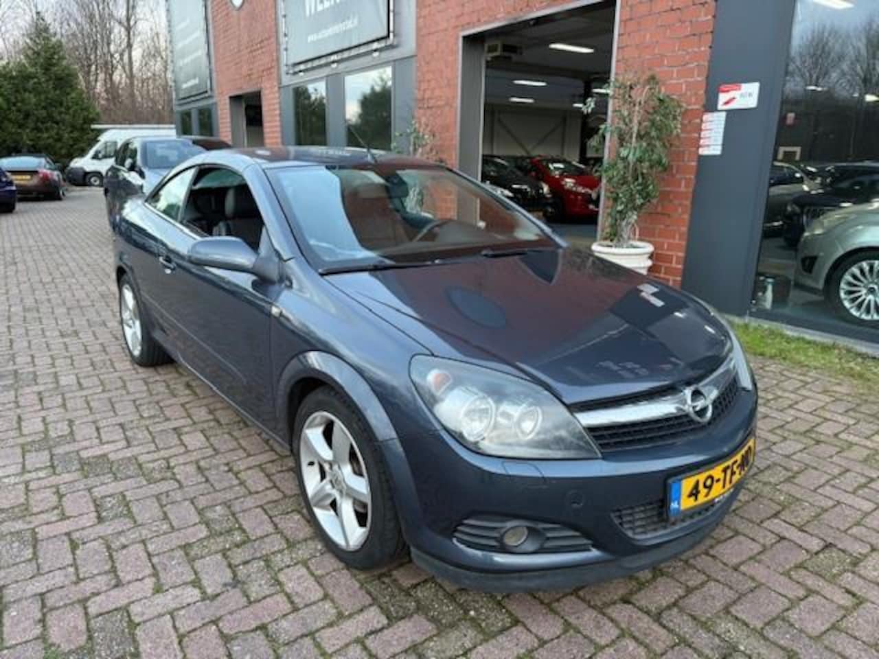 Opel Astra TwinTop - 1.6 Cosmo Leer, Navi - AutoWereld.nl