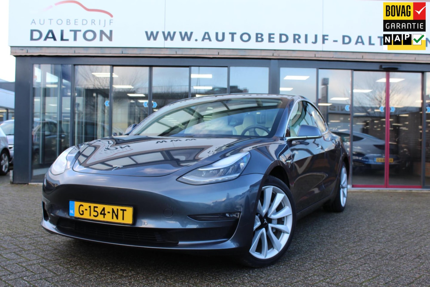 Tesla Model 3 - Long Range RWD Long Range AWD 75 kWh / WIT LEER / 19'' LM / PANODAK / INCL. BTW - AutoWereld.nl