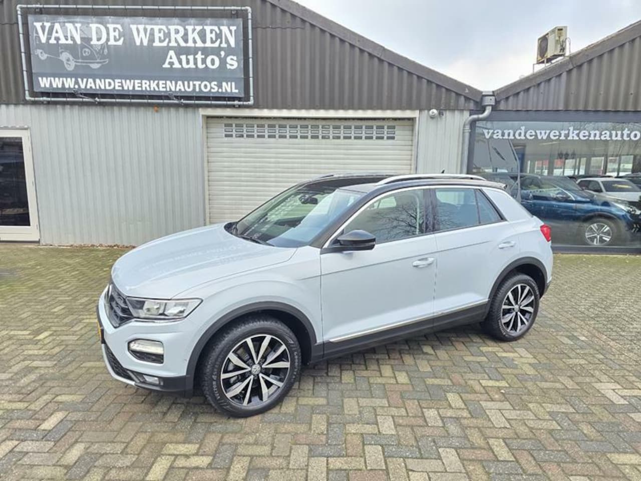 Volkswagen T-Roc - 1.5 TSI Sport AUTOMAAT Clima|Navi|Pdc|Trekhaak!! - AutoWereld.nl