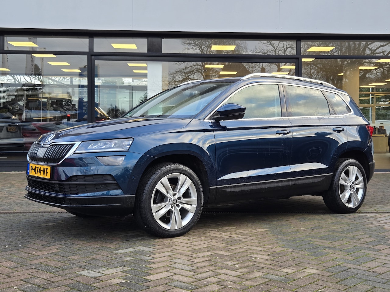 Skoda Karoq - 1.5 TSI ACT STYLE BUSINESS | LEDER | DIGITAL COCKPIT | TREKHAAK | ELEKTR STOELEN | VERWARM - AutoWereld.nl