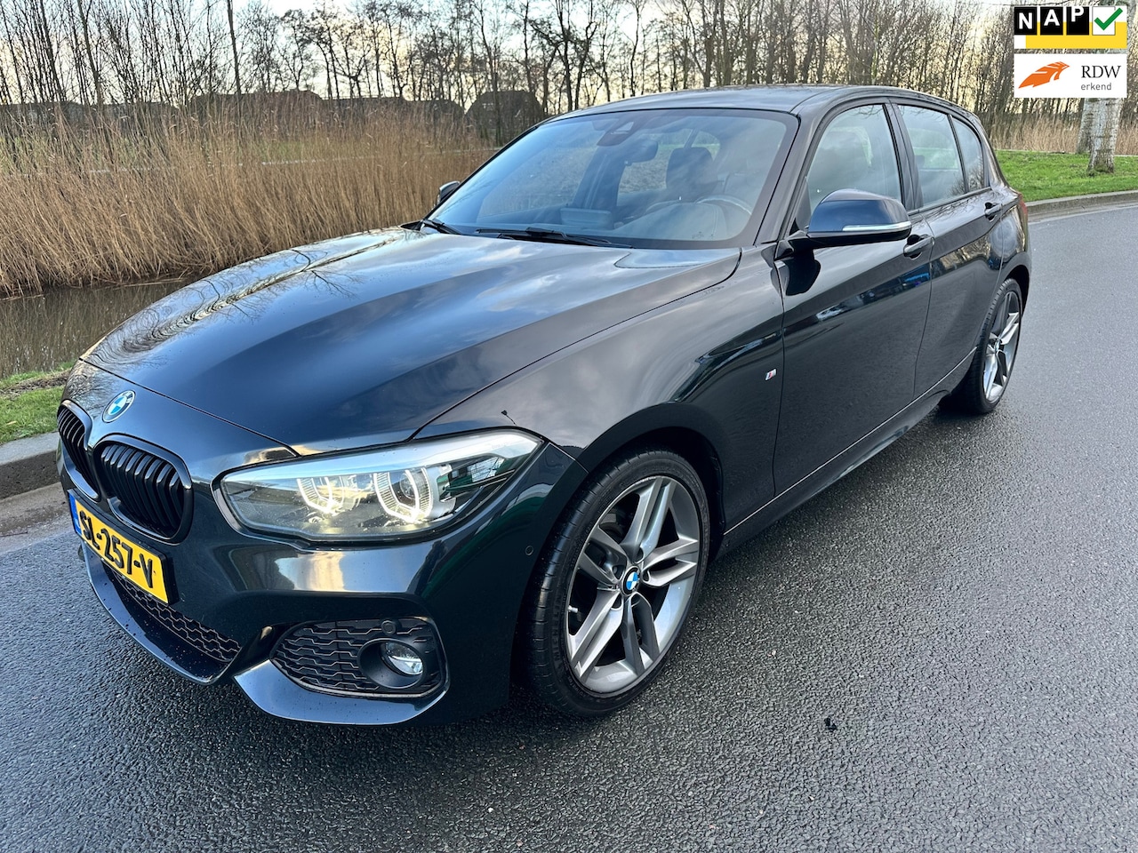 BMW 1-serie - 120i High Executive 2018/M-Pakket/ORG NL/Sportstoelen/Breedbeeld NAVI/Camera/Line assist/I - AutoWereld.nl