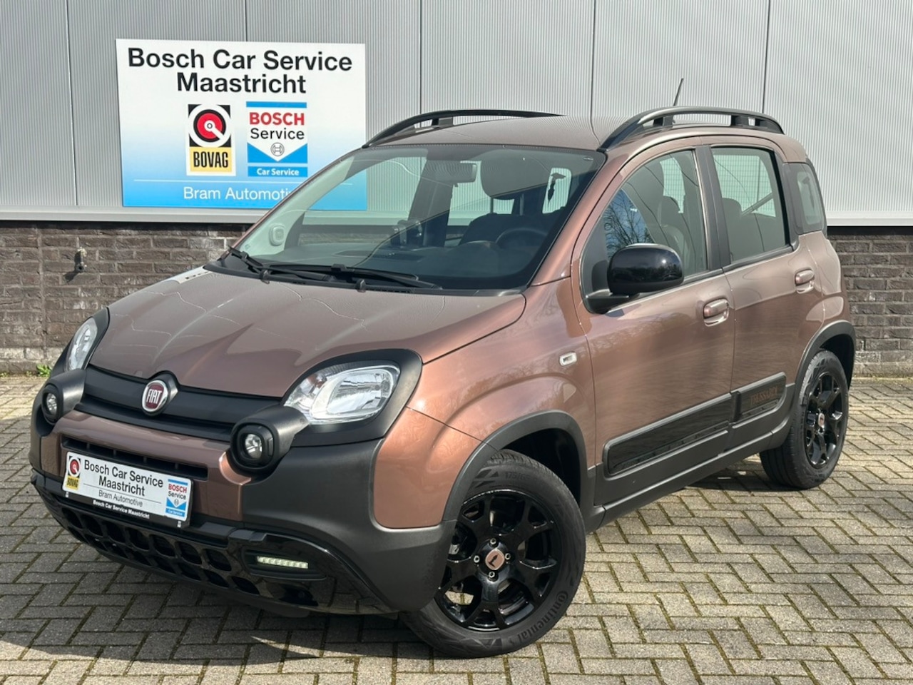 Fiat Panda - 1.2 City Cross Trussardi | Italian Brown | Leer | Unieke verschijning Interesse, Proefrit? - AutoWereld.nl