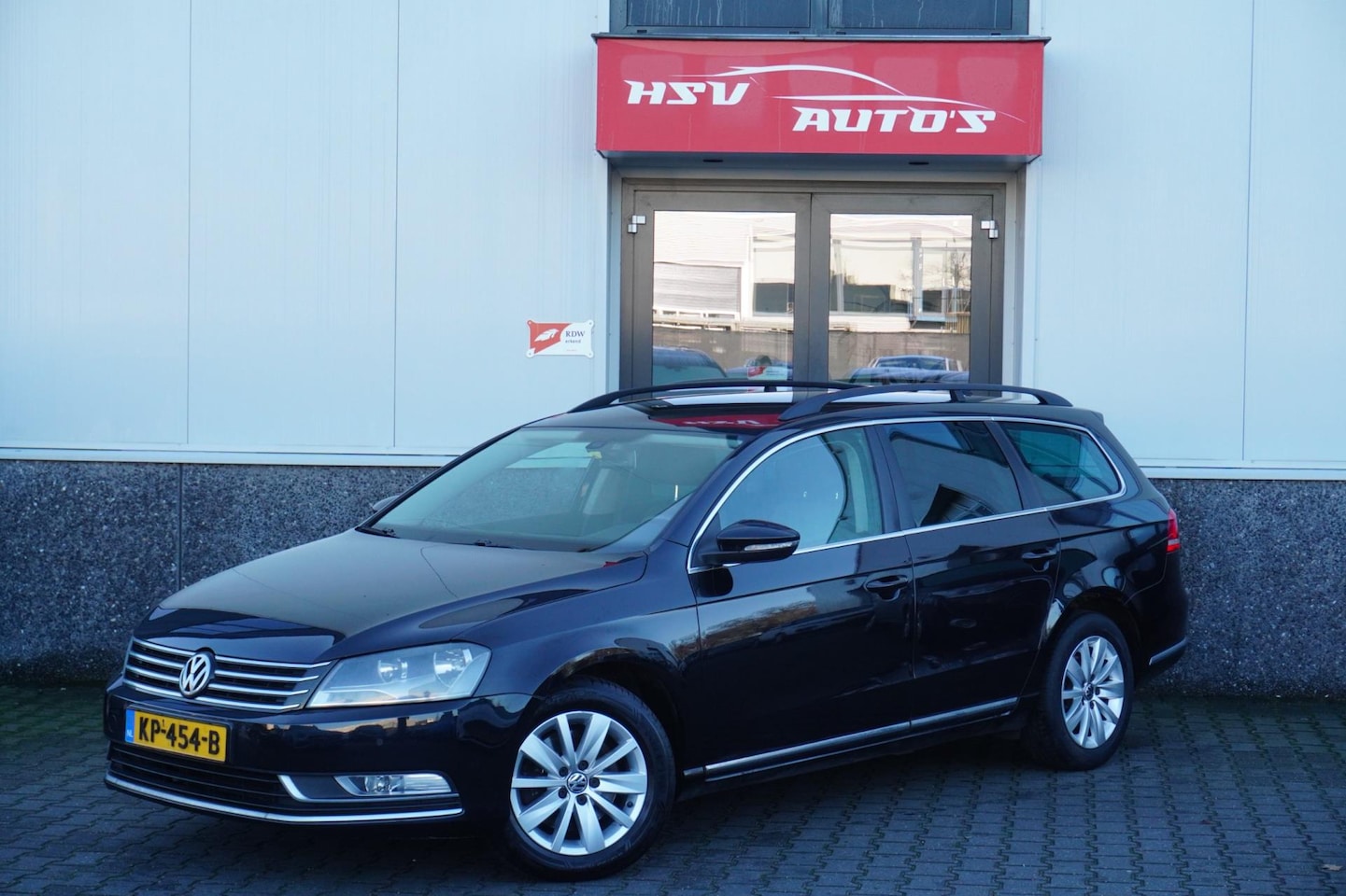 Volkswagen Passat Variant - 1.6 TDI Highline BlueMotion navi LM cruise - AutoWereld.nl