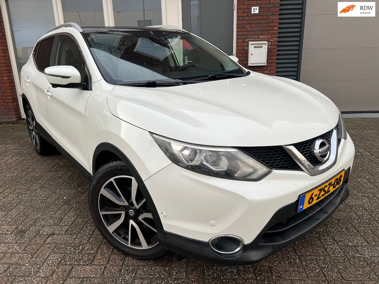 Nissan Qashqai - 1.2 Tekna / Navi / Camera / Leder / PDC / AUX - AutoWereld.nl