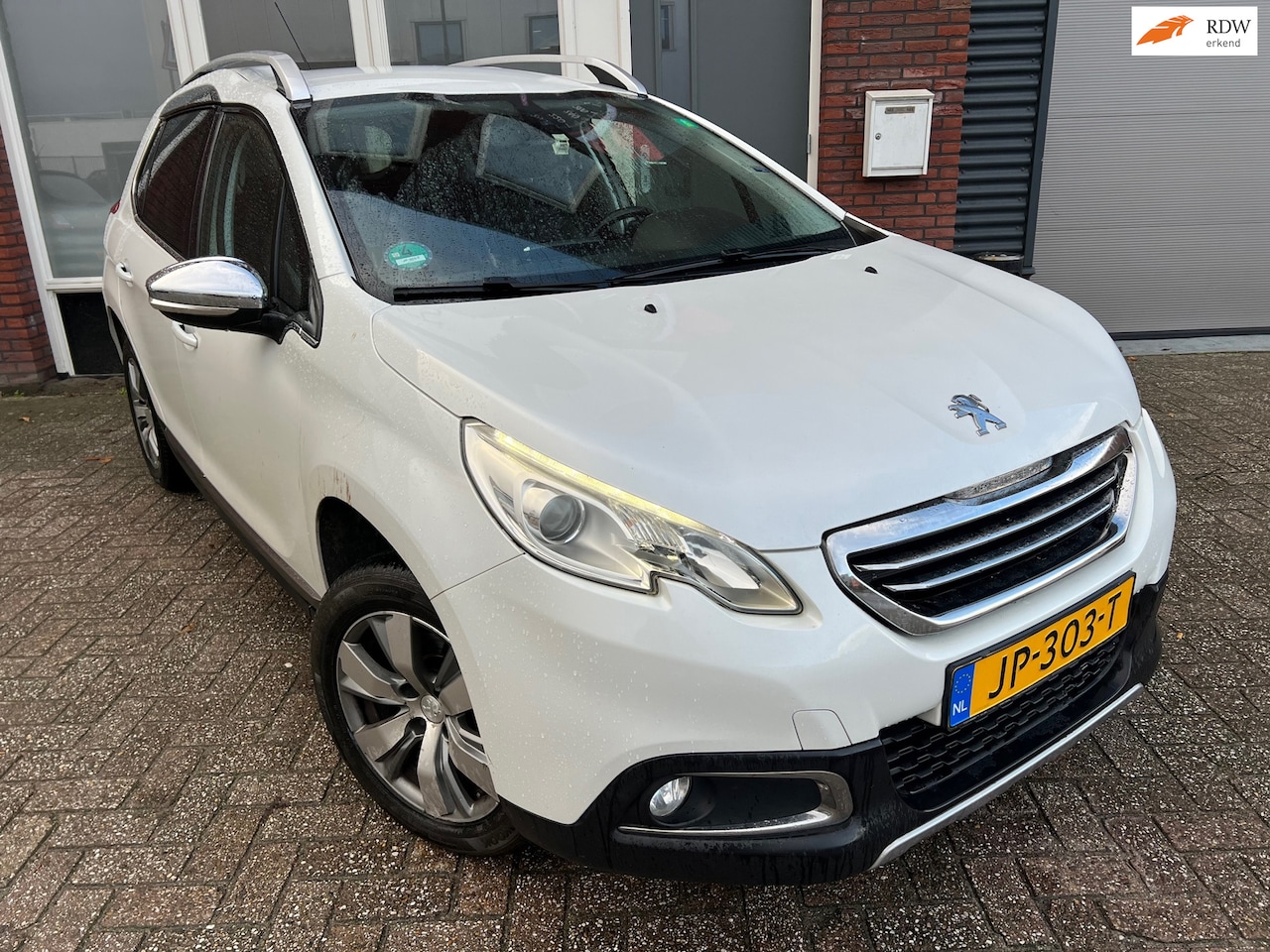 Peugeot 2008 - 1.6 VTi Première / Leder / Navi / PDC / Cruise / LED - AutoWereld.nl