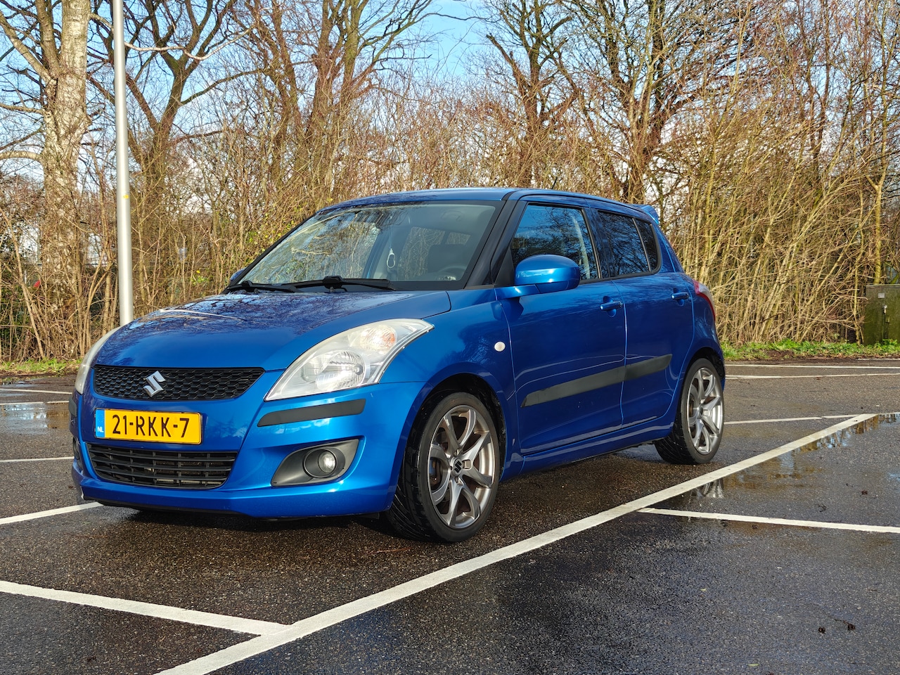 Suzuki Swift - 1.2 Exclusive EASSS Luxe uitvoering met extra's - AutoWereld.nl