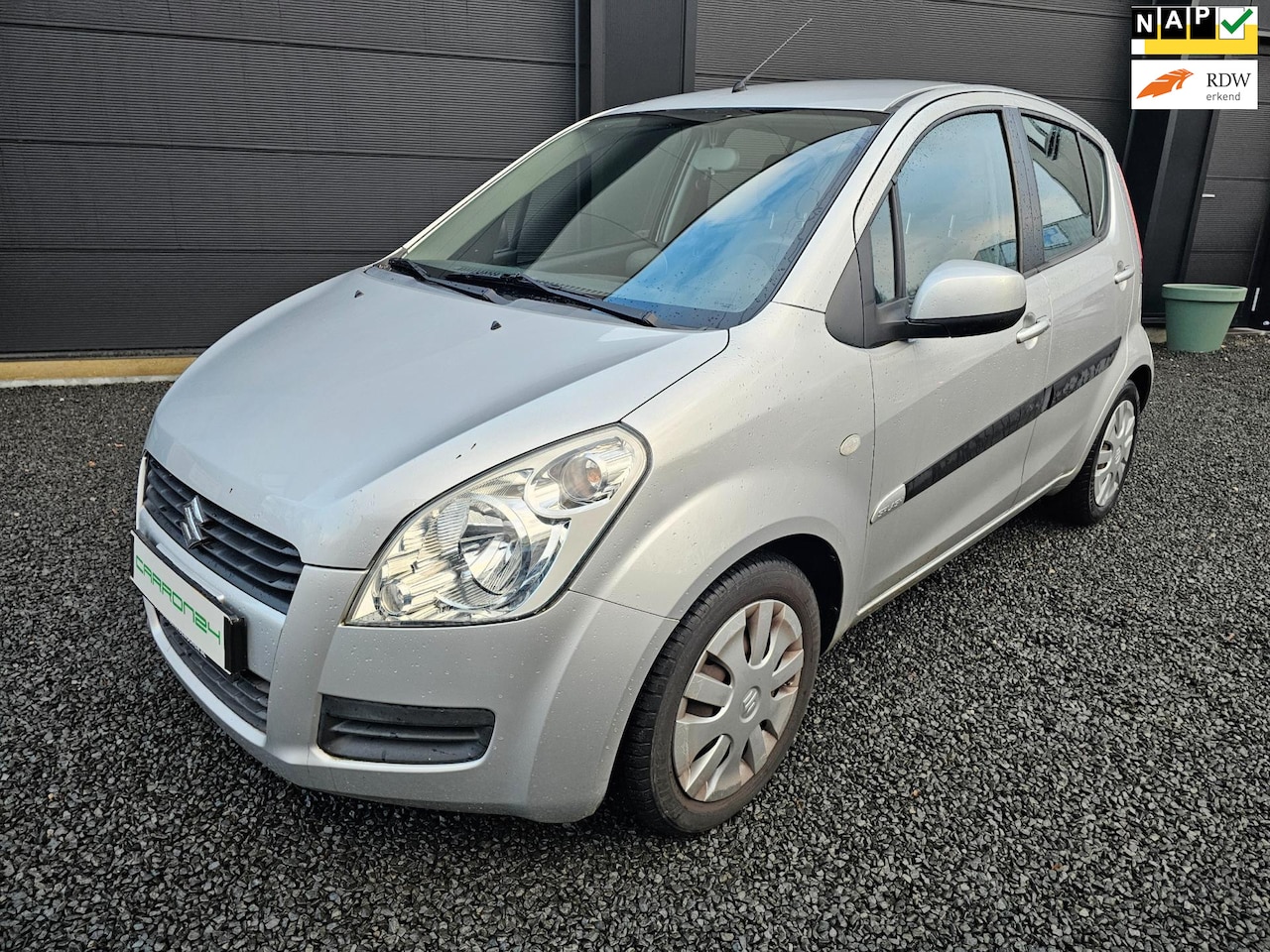 Suzuki Splash - 1.2 Comfort AUTOMAAT | 32.000km | 1e Eig.| Airco | PDC | - AutoWereld.nl