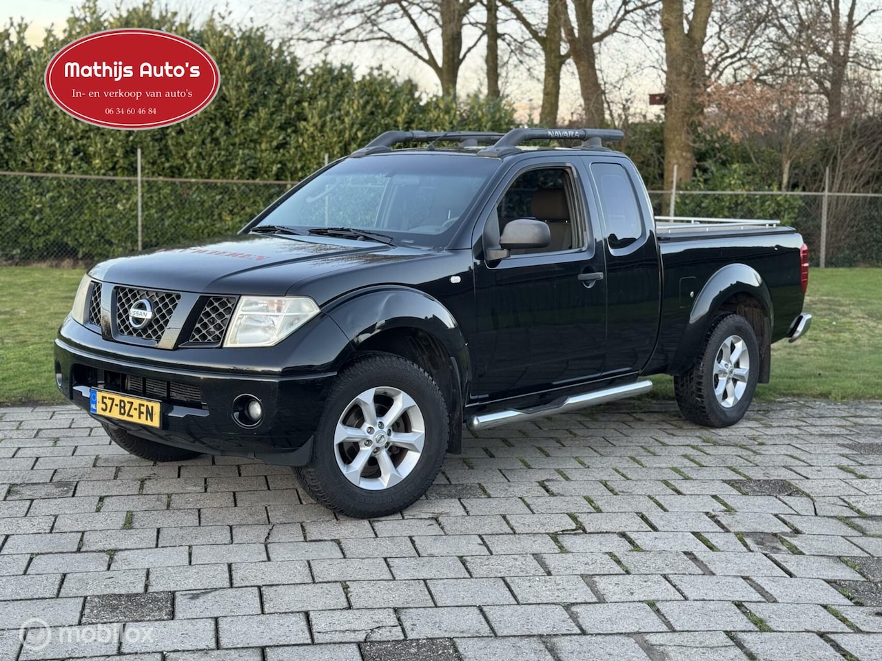 Nissan Navara - 2.5 dCi LE King Cab 4wd Airco Nette staat! - AutoWereld.nl