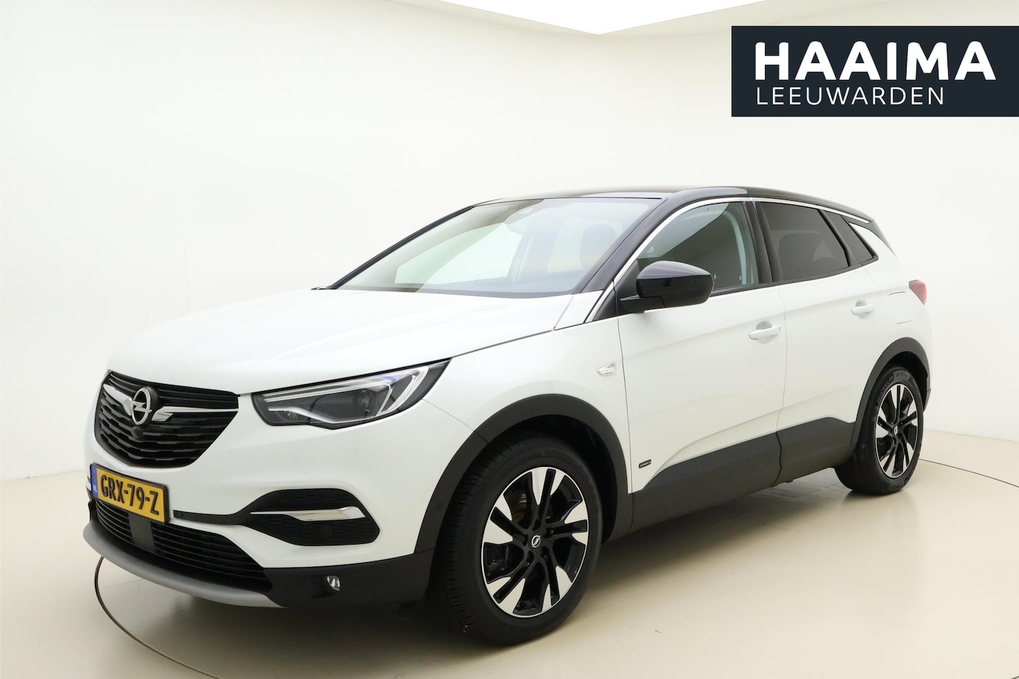 Opel Grandland X - 1.6 Turbo Hybrid4 Innovation 300 PK | Navigatie | Rondomzicht Camera | Zwart dak | Keyless - AutoWereld.nl