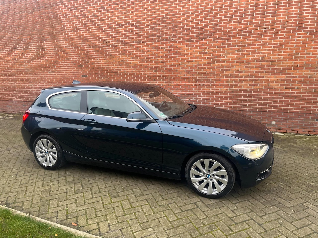 BMW 1-serie - 118d High Executive Leder Navi Xenon - AutoWereld.nl