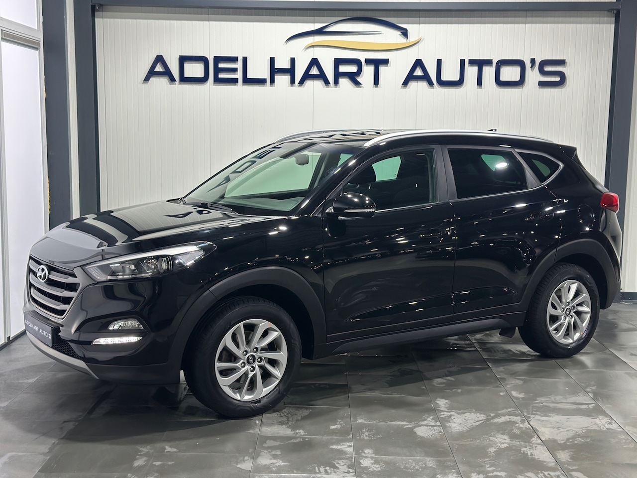 Hyundai Tucson - 1.6 GDi Comfort / Navigatie full map / Camera / Cruise control / Parkeer sensoren / Stoelv - AutoWereld.nl