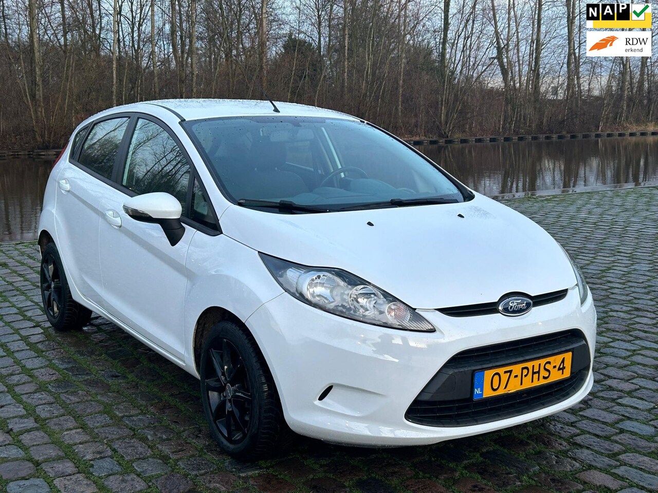 Ford Fiesta - 1.25 Limited 2e eigenaar dealer onderhouden airco elektrische ramen cv op afs - AutoWereld.nl