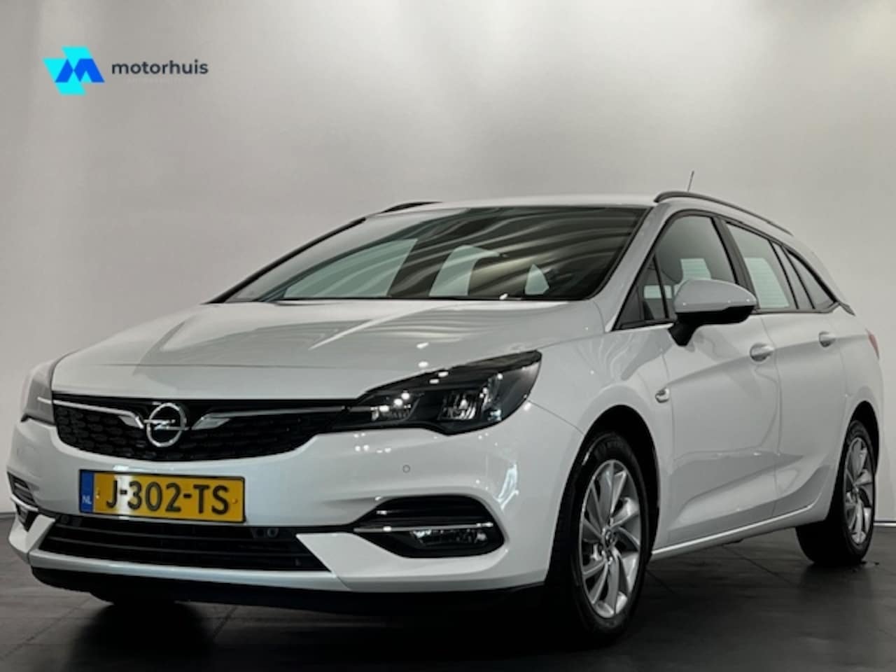 Opel Astra Sports Tourer - 1.4 Turbo 145pk Start/Stop Aut Edition/navigatie/camera - AutoWereld.nl