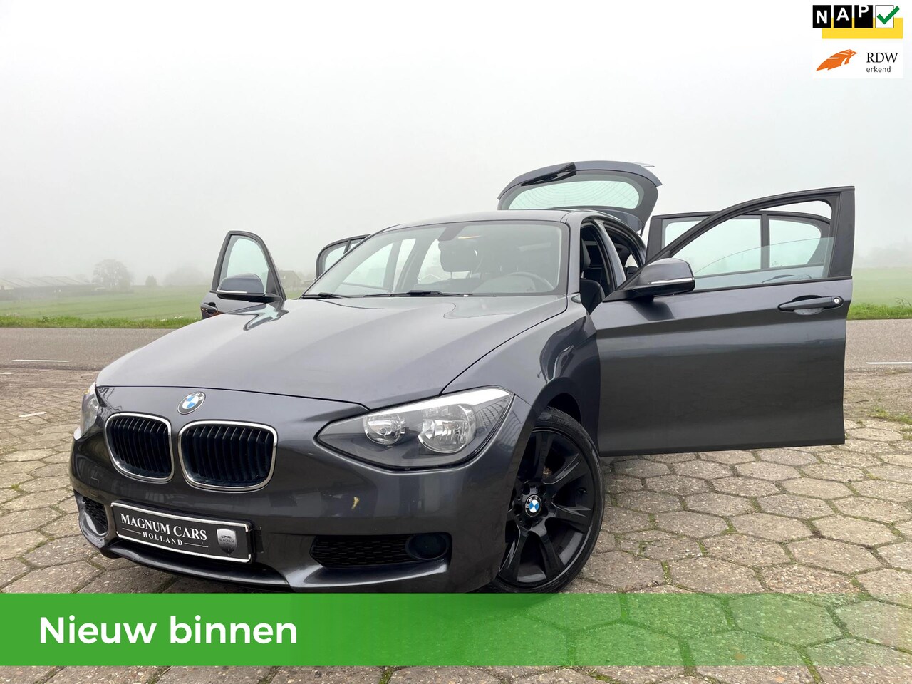 BMW 1-serie - 116i 5D NAP AUTOMAAT XENON LEDER SCHERM VELGEN - AutoWereld.nl