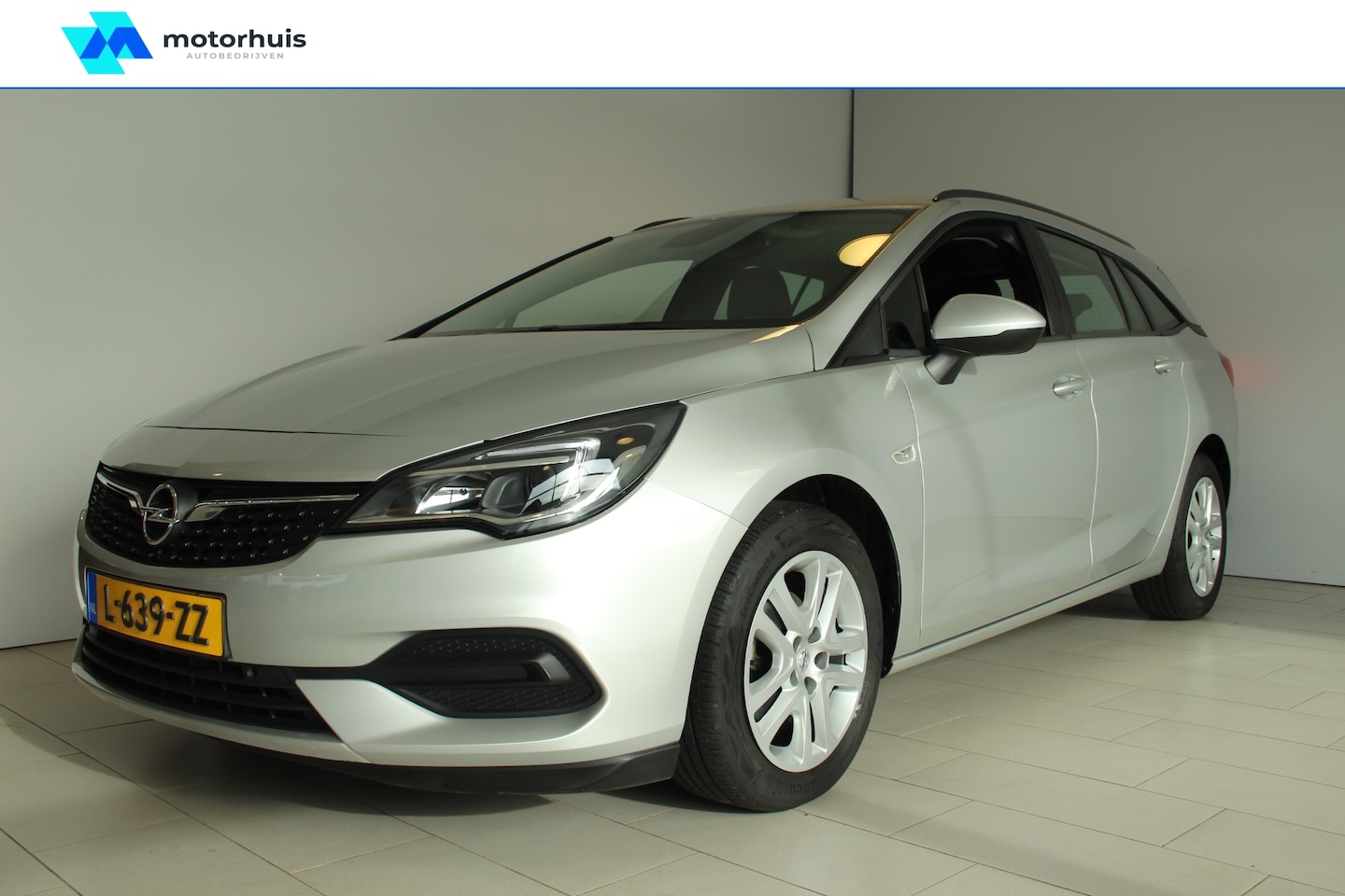 Opel Astra Sports Tourer - 1.4 Turbo 145pk Edition AUTOMAAT NAVI PDC - AutoWereld.nl