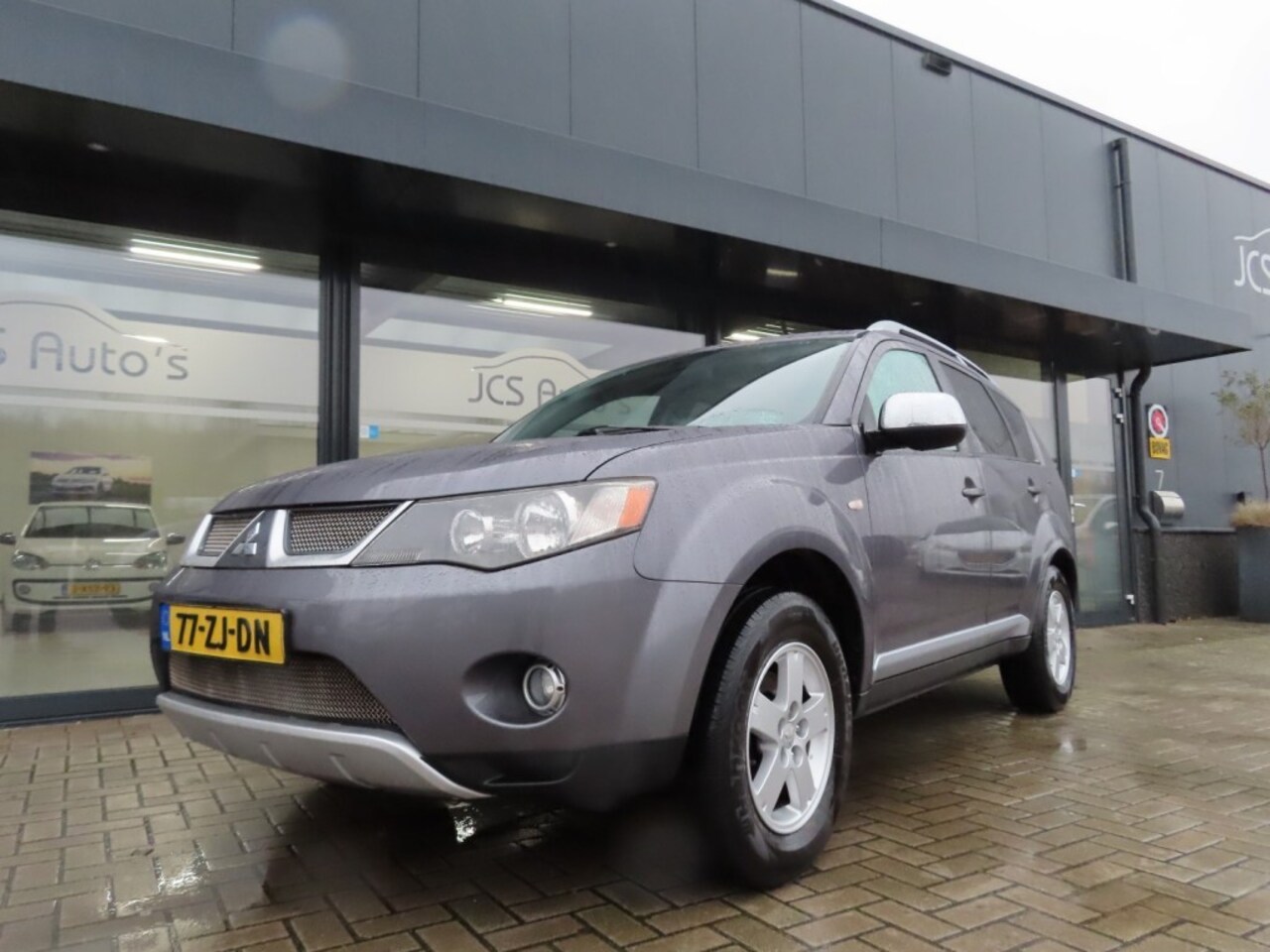 Mitsubishi Outlander - 2.4 Intro Edition 2 WD Ecc Leder Trekhaak 2008 - AutoWereld.nl