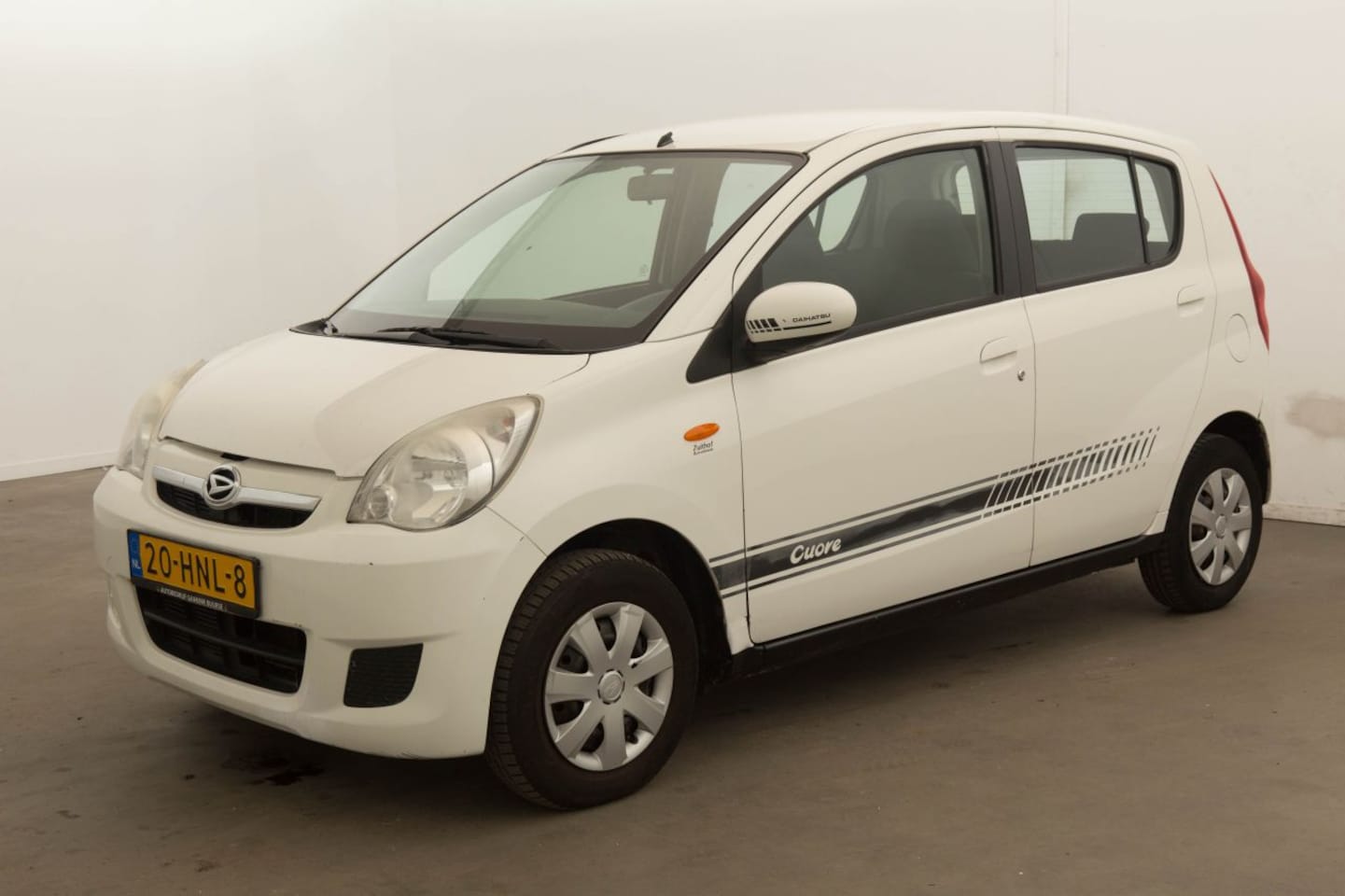 Daihatsu Cuore - 1.0 Premium Airco - AutoWereld.nl