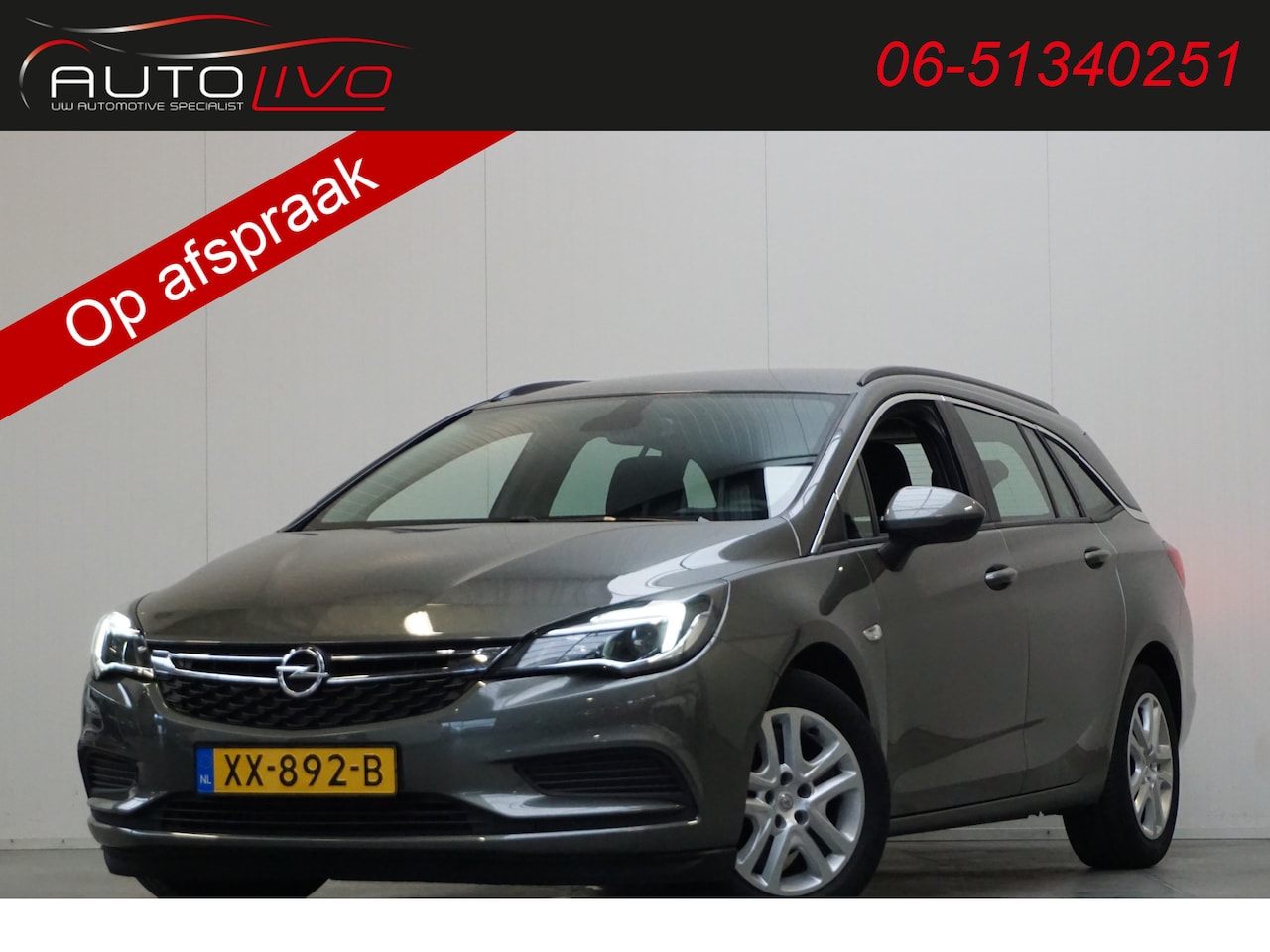 Opel Astra Sports Tourer - 1.6 CDTI Business+ NAVI AC CRUISE PDC etc. - AutoWereld.nl