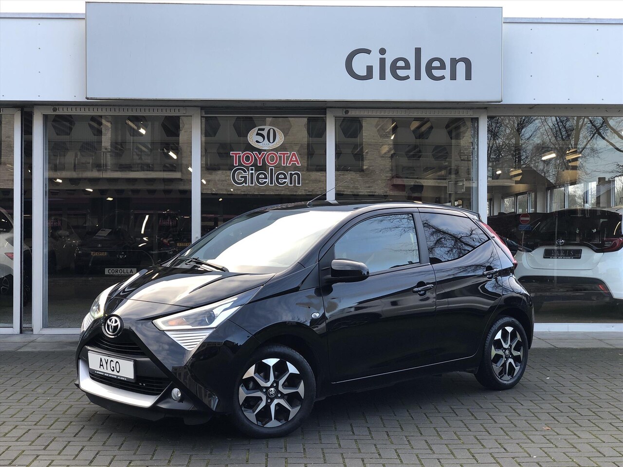 Toyota Aygo - 1.0 VVT-i X-Joy | Eerste eigenaar, Climate control, Lichtmetalen velgen, Privacy Glass, Ap - AutoWereld.nl