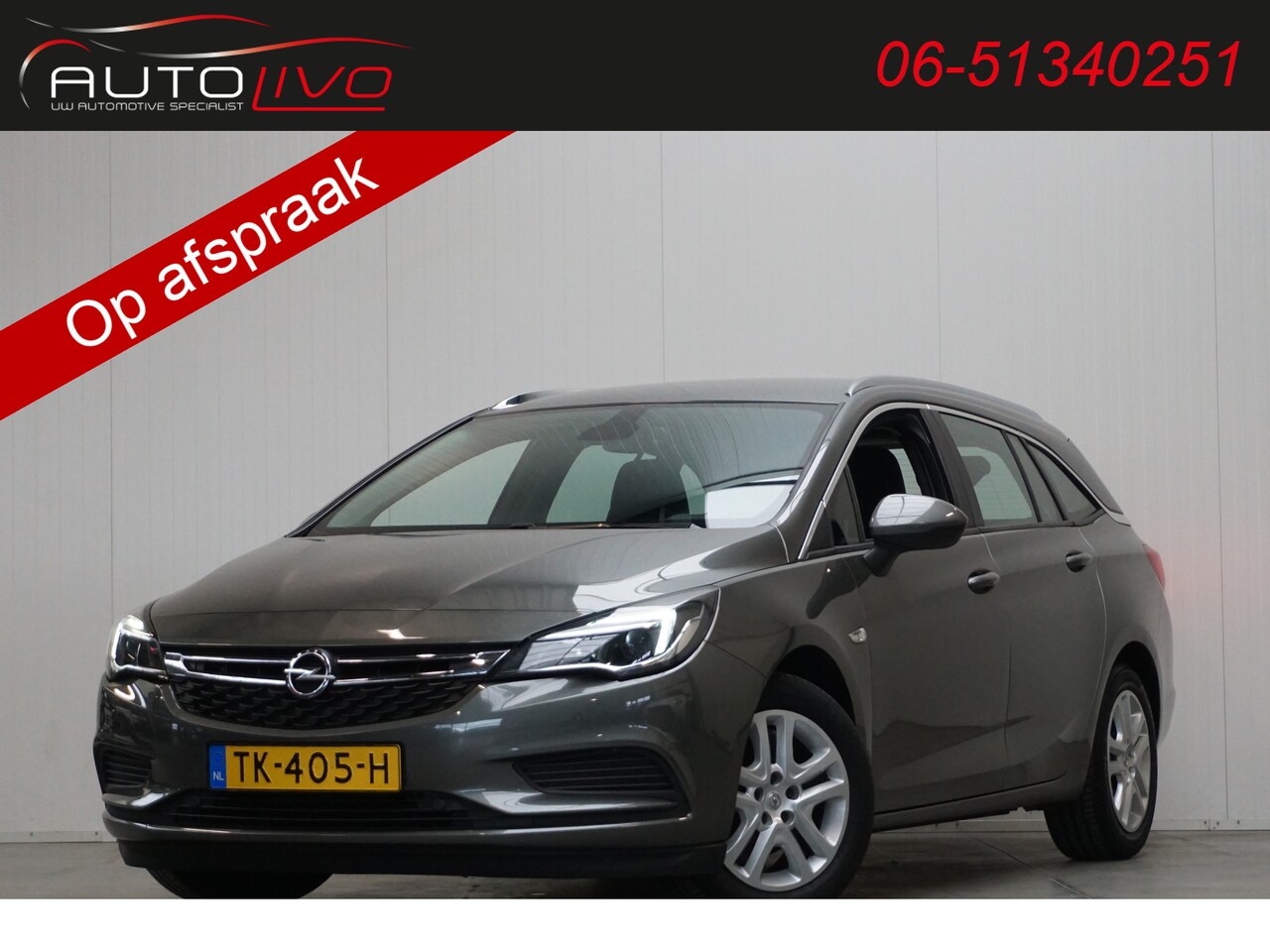 Opel Astra Sports Tourer - 1.6 CDTI Business+ ERGO NAVI APPLE CLIMA PDC TREKHAAK etc. - AutoWereld.nl