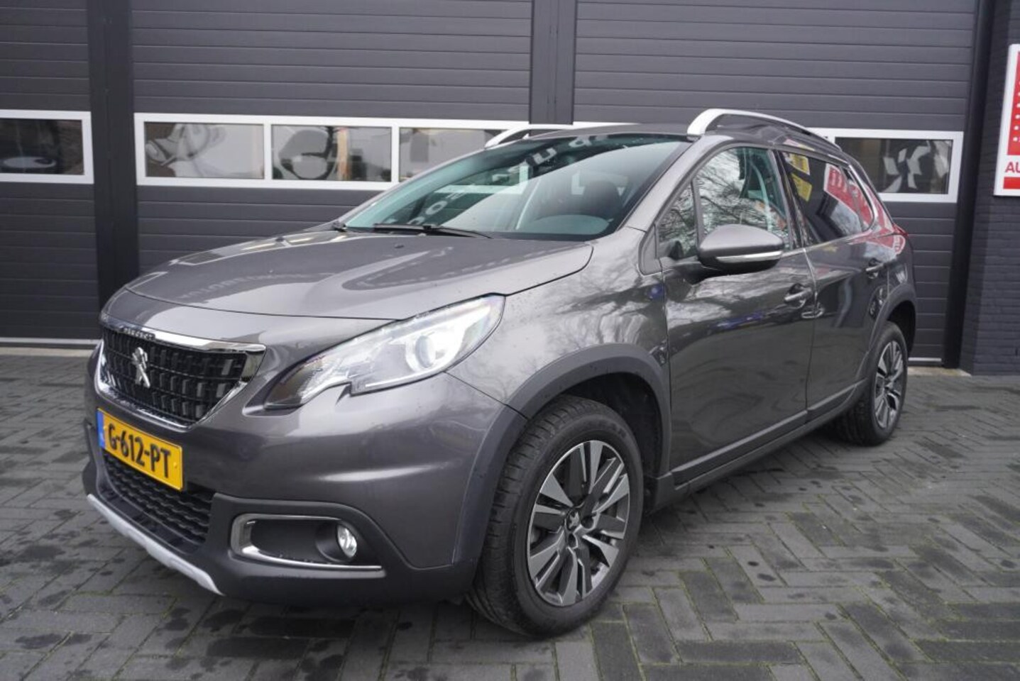 Peugeot 2008 - 1.2 PureTech Aut/Airco/Navi/CC/Camera - AutoWereld.nl