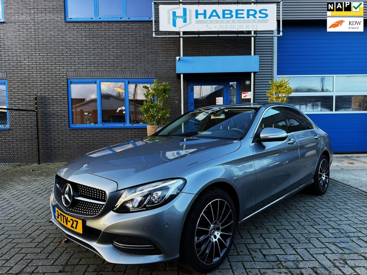 Mercedes-Benz C-klasse - 180 Ambition 156PK|Origineel NL|Navi|Xenon/Led|AUT|Sportstoelen|Flippers|Cruise|Electrisch - AutoWereld.nl