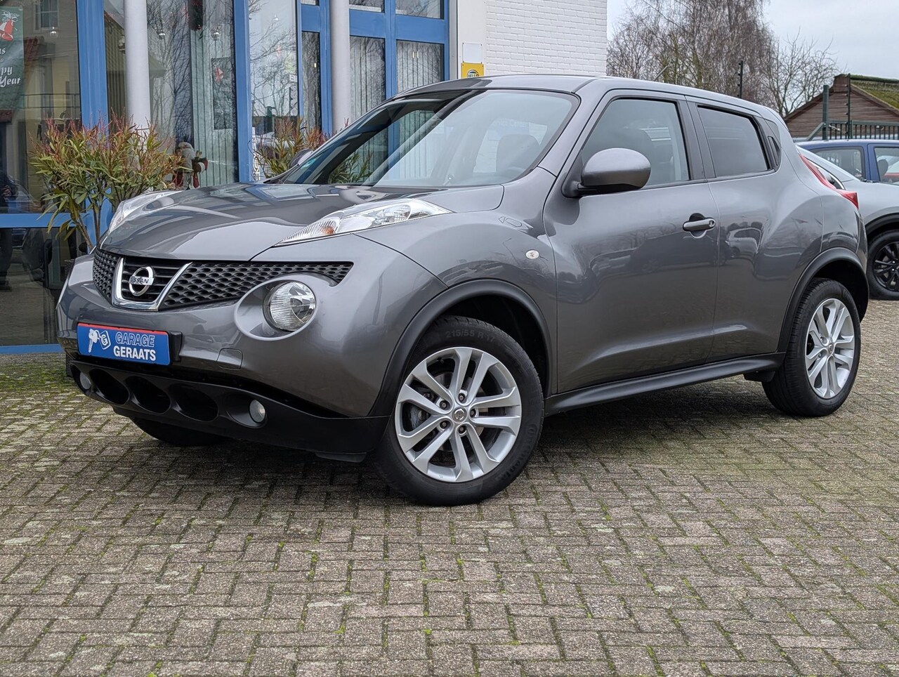 Nissan Juke - 1.6 Tekna | Navigatie, Cruise & Climate Control, Leder, Bluetooth, Parkeersensoren + Camer - AutoWereld.nl