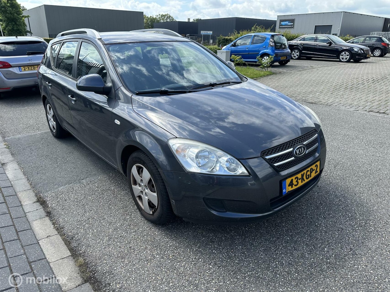 Kia Cee'd Sporty Wagon - 1.4 X-ecutive ISG vaste prijs - AutoWereld.nl