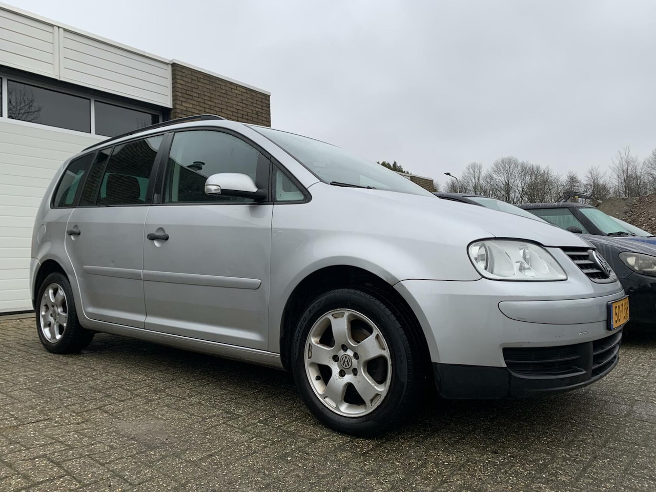 Volkswagen Touran - 1.6-16V FSI Optive I Carplay Airco Trekhaak Cruise control - AutoWereld.nl