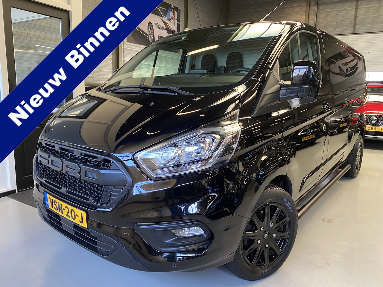 Ford Transit Custom - 300 2.0 TDCI L2H2 Limited Cruise, Camera, Navi, Stoelverwarming, 170 PK - AutoWereld.nl