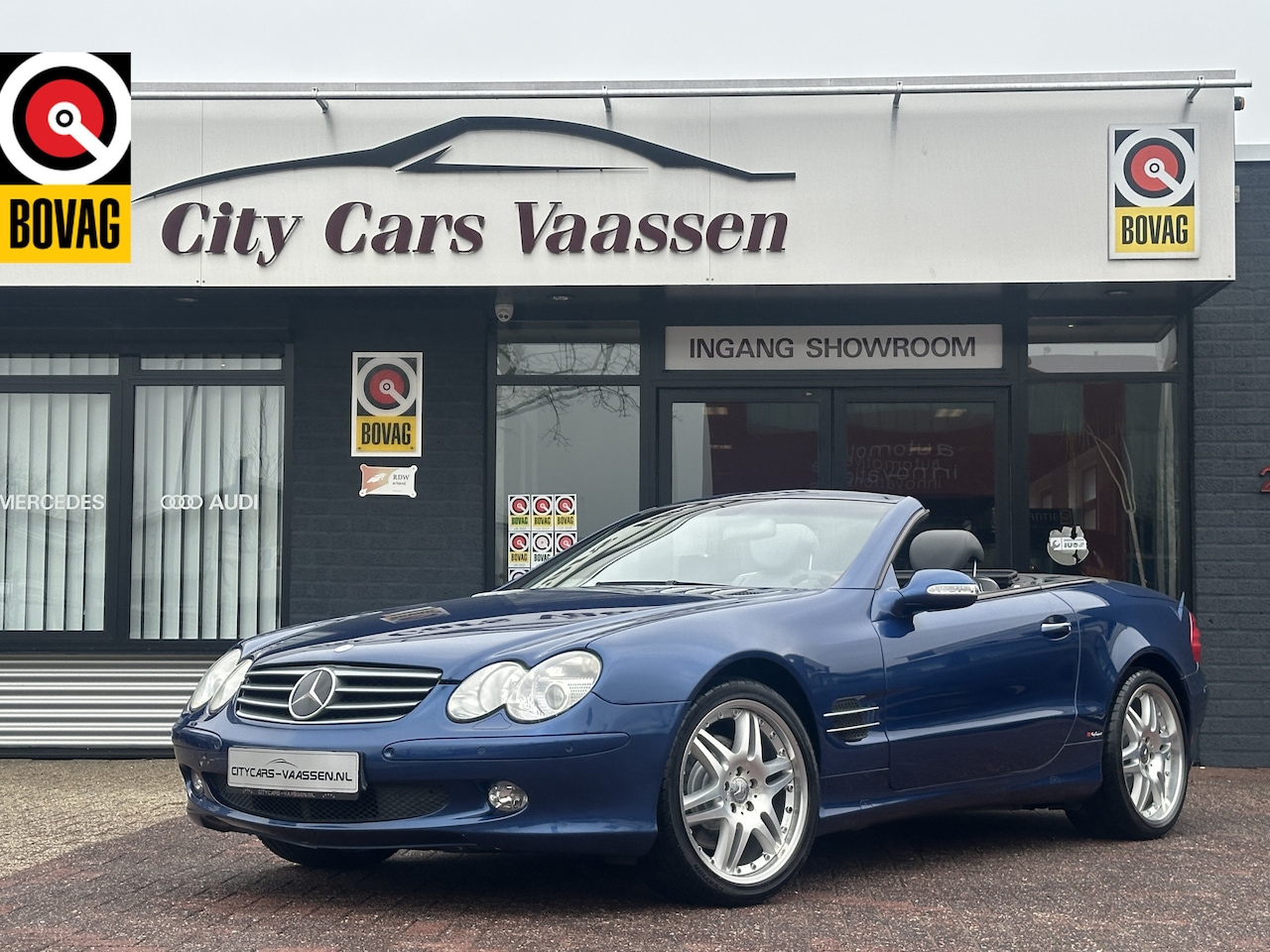 Mercedes-Benz SL-klasse Cabrio - 500 V8 youngtimer 306 pk in nieuwstaat navigatie panoramadak xenon climate ctr lmv 19 inch - AutoWereld.nl