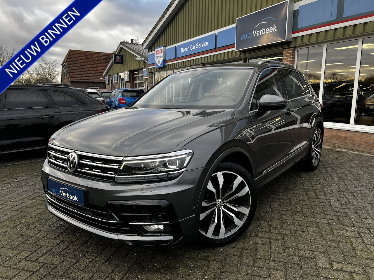 Volkswagen Tiguan - 2.0TSi 4Motion Highline | R-Line | 20" Suzuka velgen | Easy Open achterklep | Wegklapbare - AutoWereld.nl