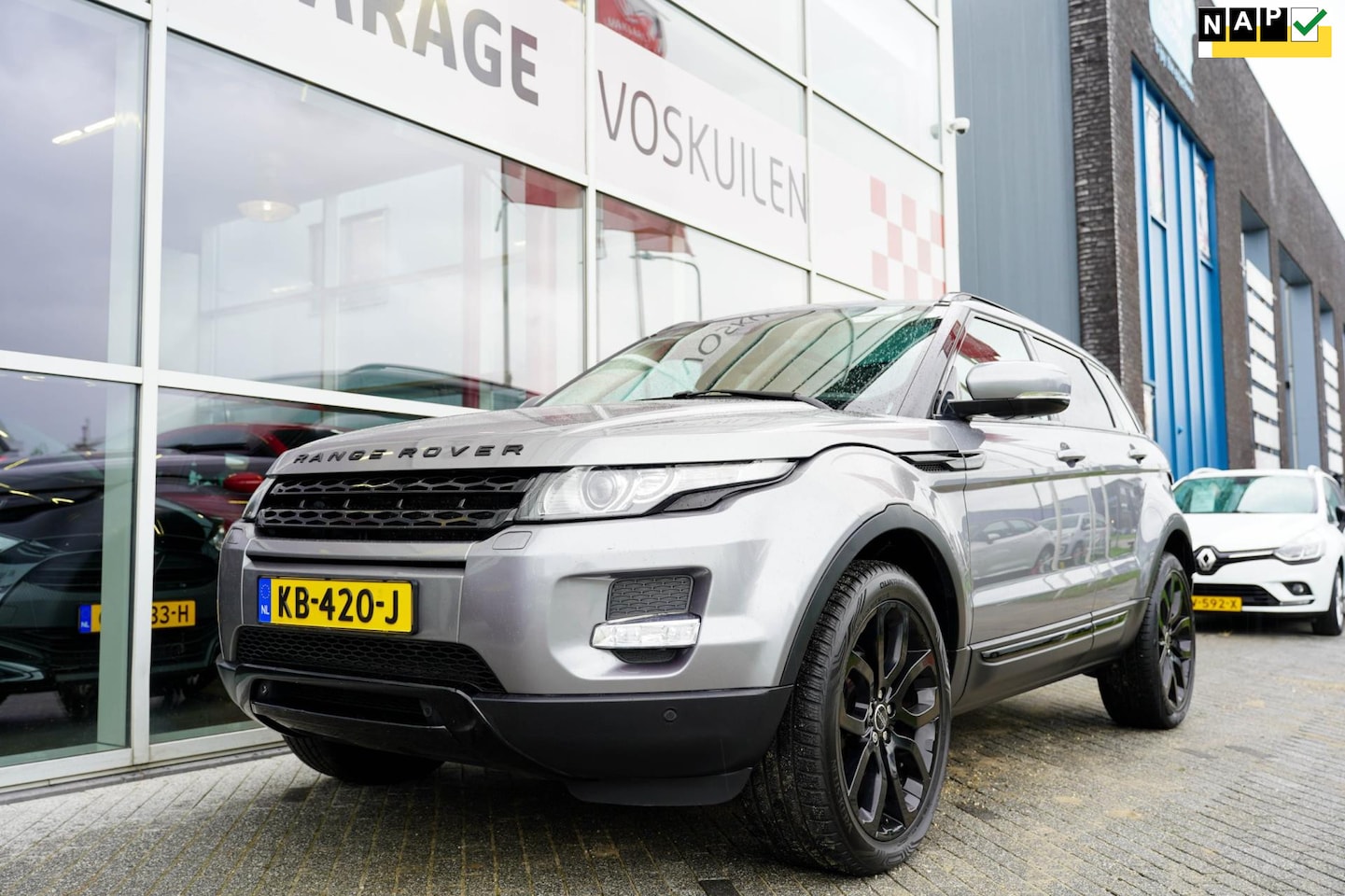 Land Rover Range Rover Evoque - 2.0 Si 4WD Prestige | Trekhaak | Panoramadak |Beige Leder - AutoWereld.nl