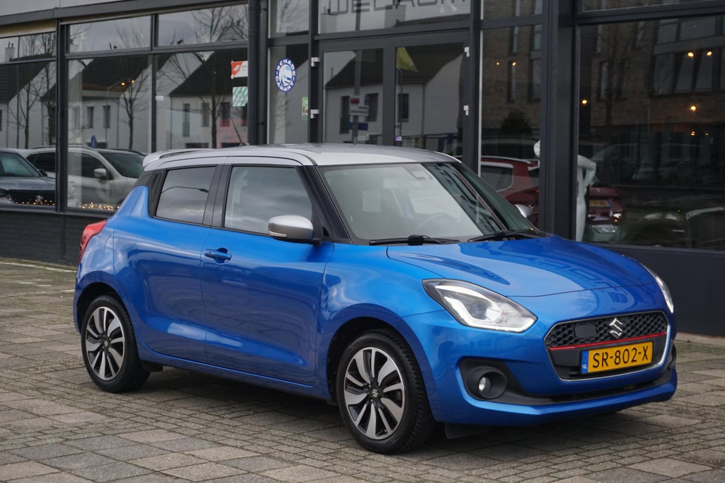 Suzuki Swift - 1.0 Stijl Smart Hybrid | trekhaak | CarPlay | camera - AutoWereld.nl