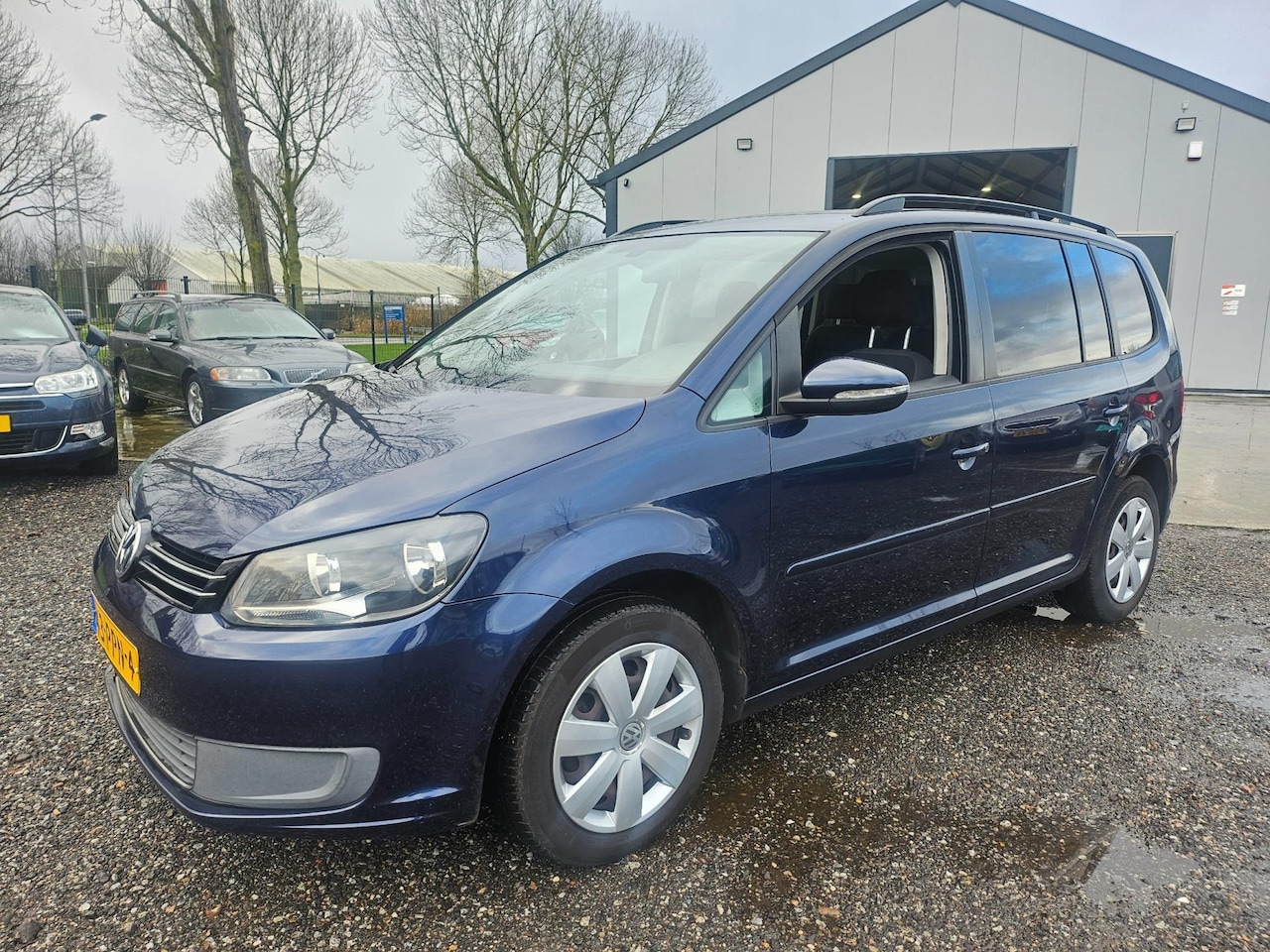 Volkswagen Touran - 1.2 TSI BlueMotion 7PERS NAVI - AutoWereld.nl