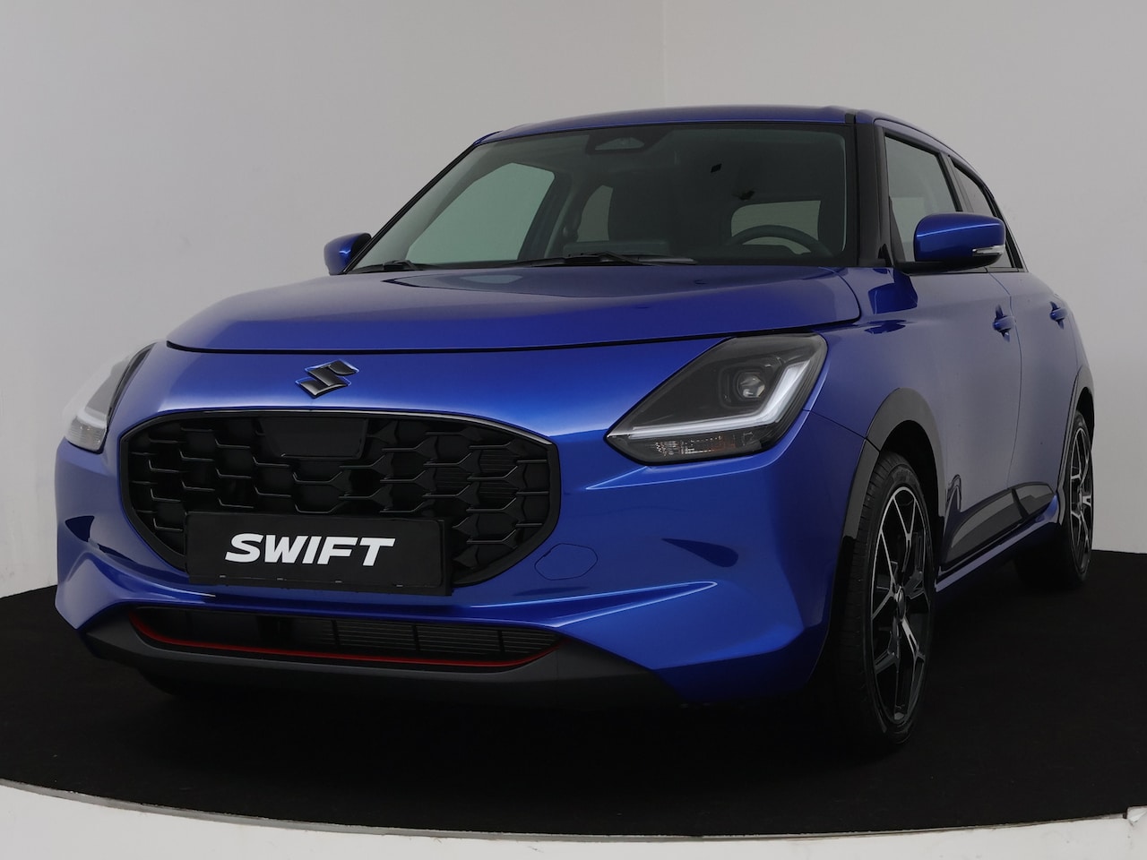 Suzuki Swift - 1.2 Style Smart Hybrid | Climate Control | Apple Carplay / Android Auto | Keyless Entry | - AutoWereld.nl