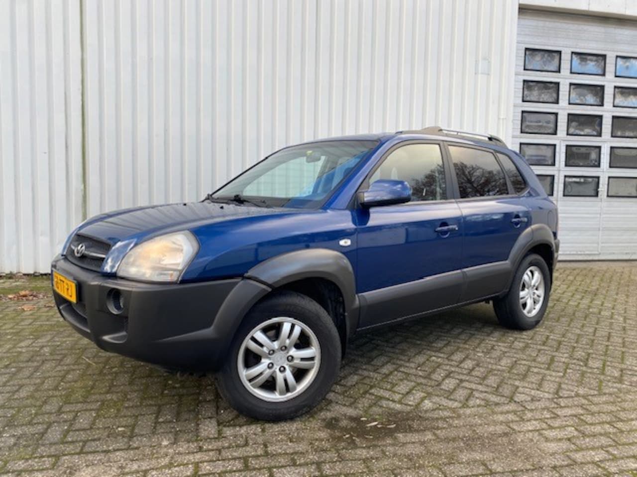 Hyundai Tucson - 2.0i Dynamic TREKHAAK | ZGAN BANDEN | ONDERHOUDEN | AIRCO - AutoWereld.nl