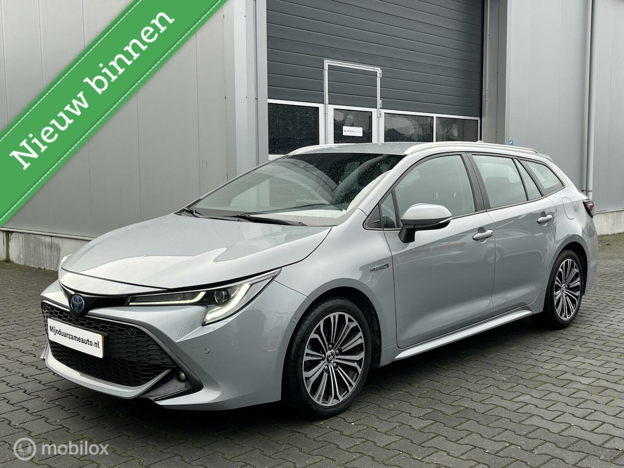 Toyota Corolla Touring Sports - 1.8 Hybrid Aut. Led, Trekhaak - AutoWereld.nl